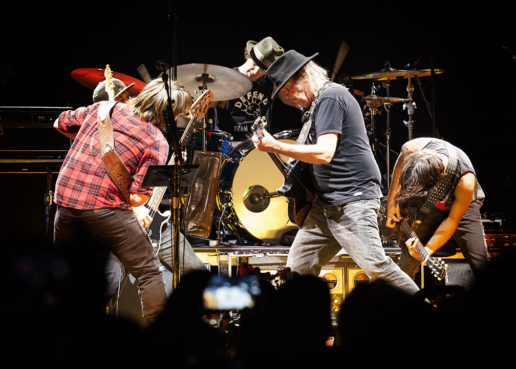 behind neil young spotify fraught with