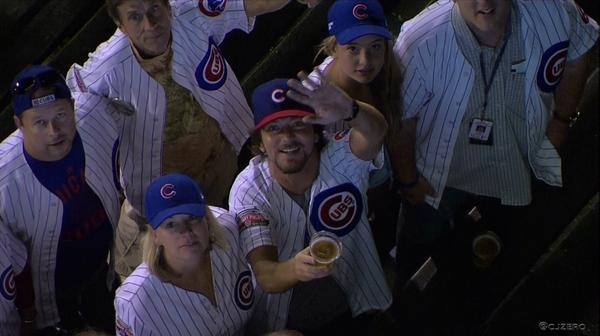Pearl Jam's Eddie Vedder goes to bat for the Chicago Cubs