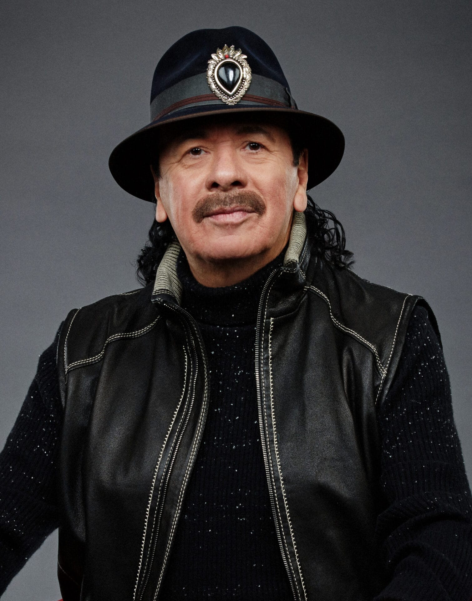 Listen: Carlos Santana Taps Darryl “DMC” McDaniels on Reimagined Single “Let The Guitar Play”